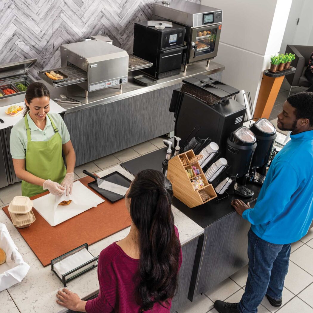 image of Welbilt team in a kitchen.